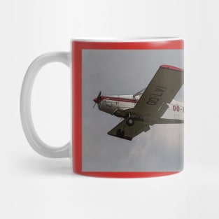 airplane in the sky Mug